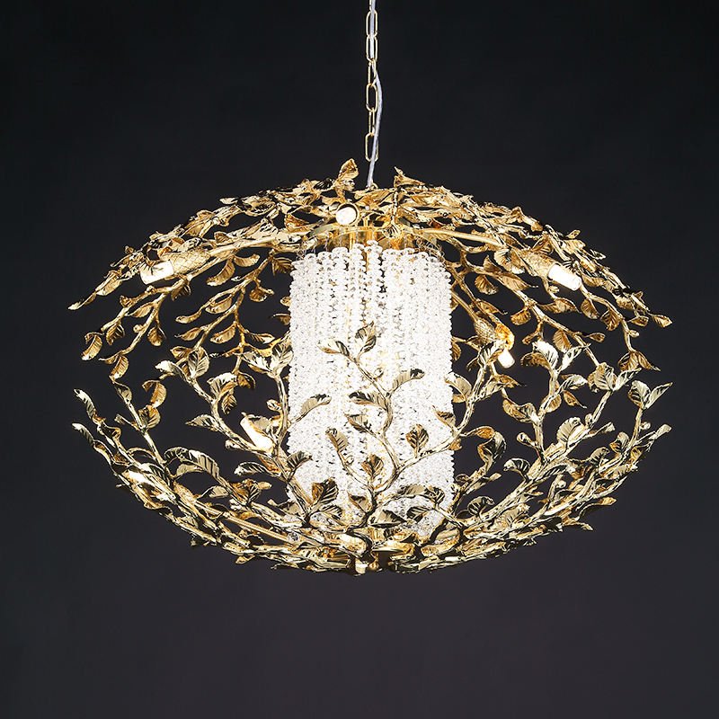 Stunning branch chandelier showcasing a golden, leaf-adorned exterior surrounding a dazzling crystal core. The chandelier's outer structure features intricate gold-plated branches and leaves forming an elegant oval shape. At its center, a cylindrical cascade of crystal beads creates a luminous focal point. This exquisite branch chandelier combines nature-inspired design with opulent materials, perfect for adding glamour and warmth to sophisticated interiors.