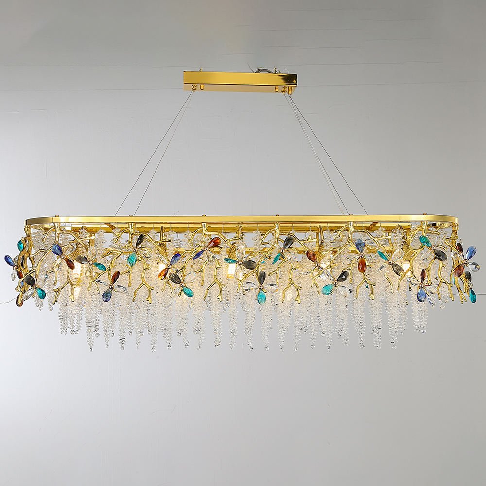 Luxe Gold Linear Branch Chandelier with Colorful Crystals in a bohemian rustic living room